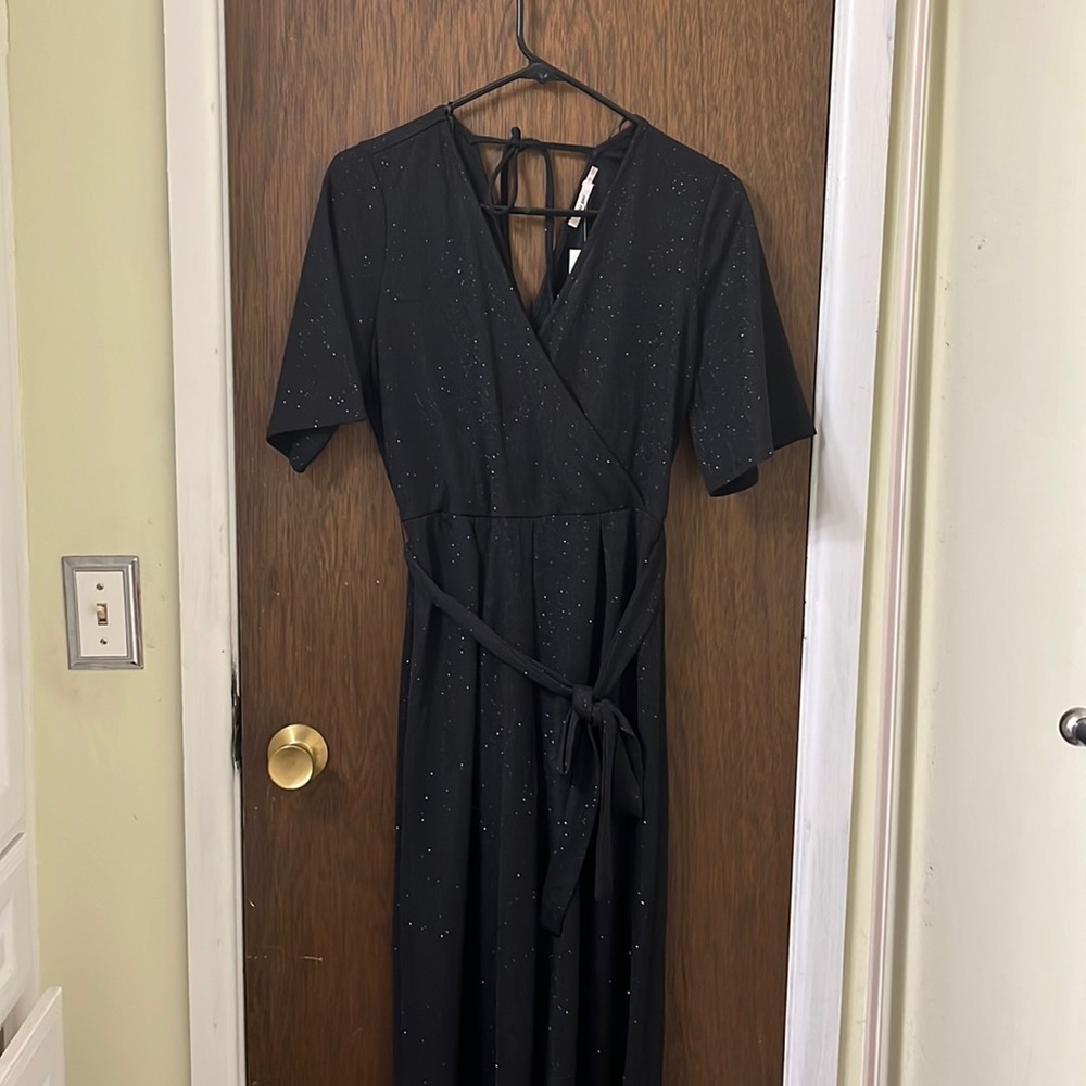 Francesca’s black sparkly jump suit